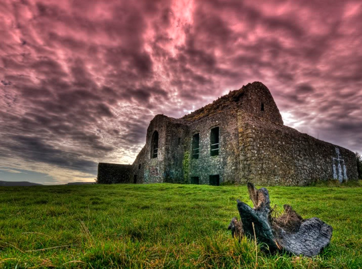 The Hellfire Club Dublin Tour Image 1 a castle on top of a grass covered field